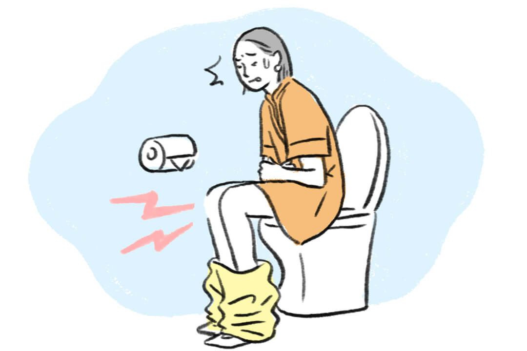 膀胱炎の症状が出ている女性